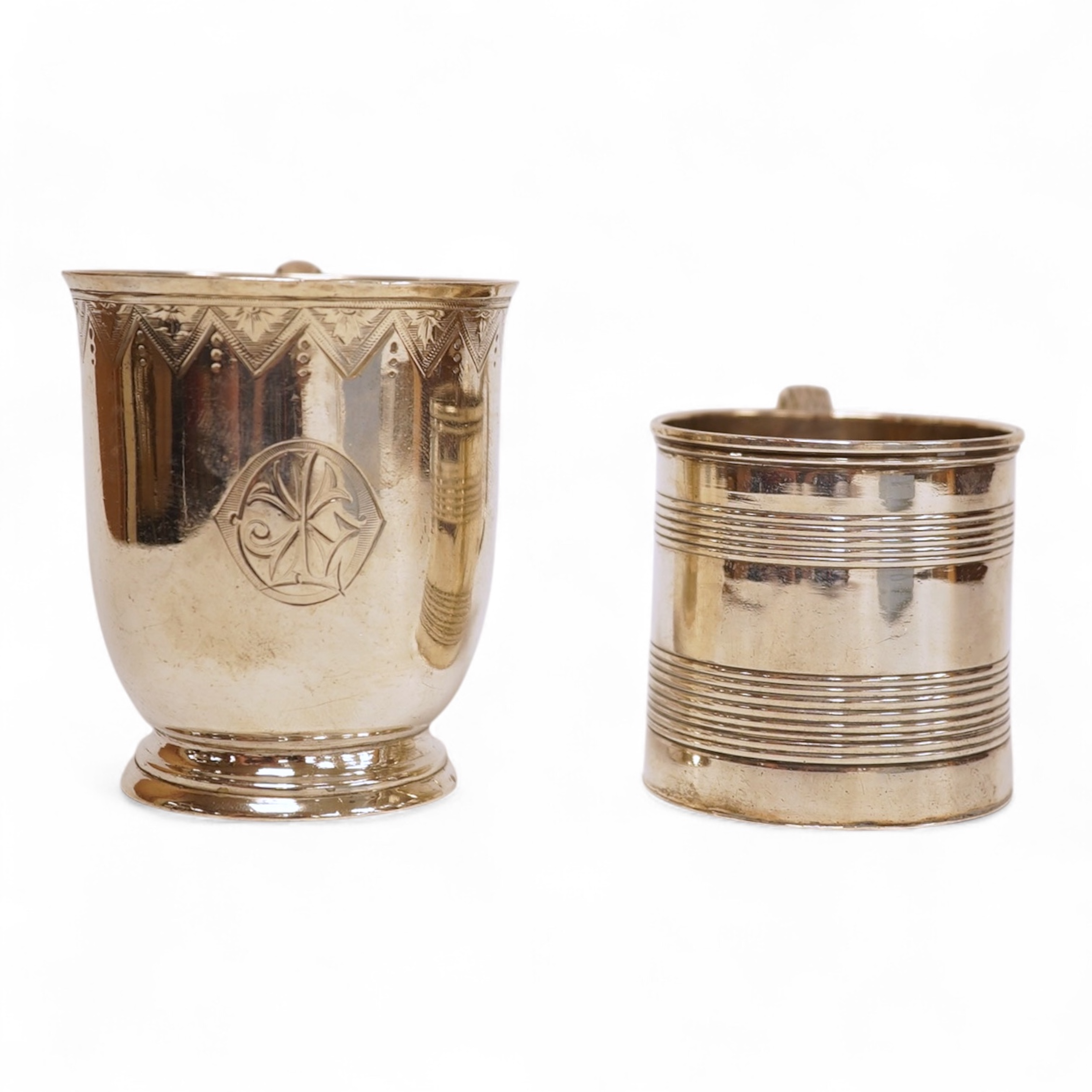 A small late George III reeded silver christening mug, London, 1818, height 51mm, together with a later Victorian silver christening mug, Arthur Sibley, London, 1764.